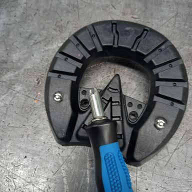 TP Horseshoe with pins on the bottom, showing tapping/stud tool